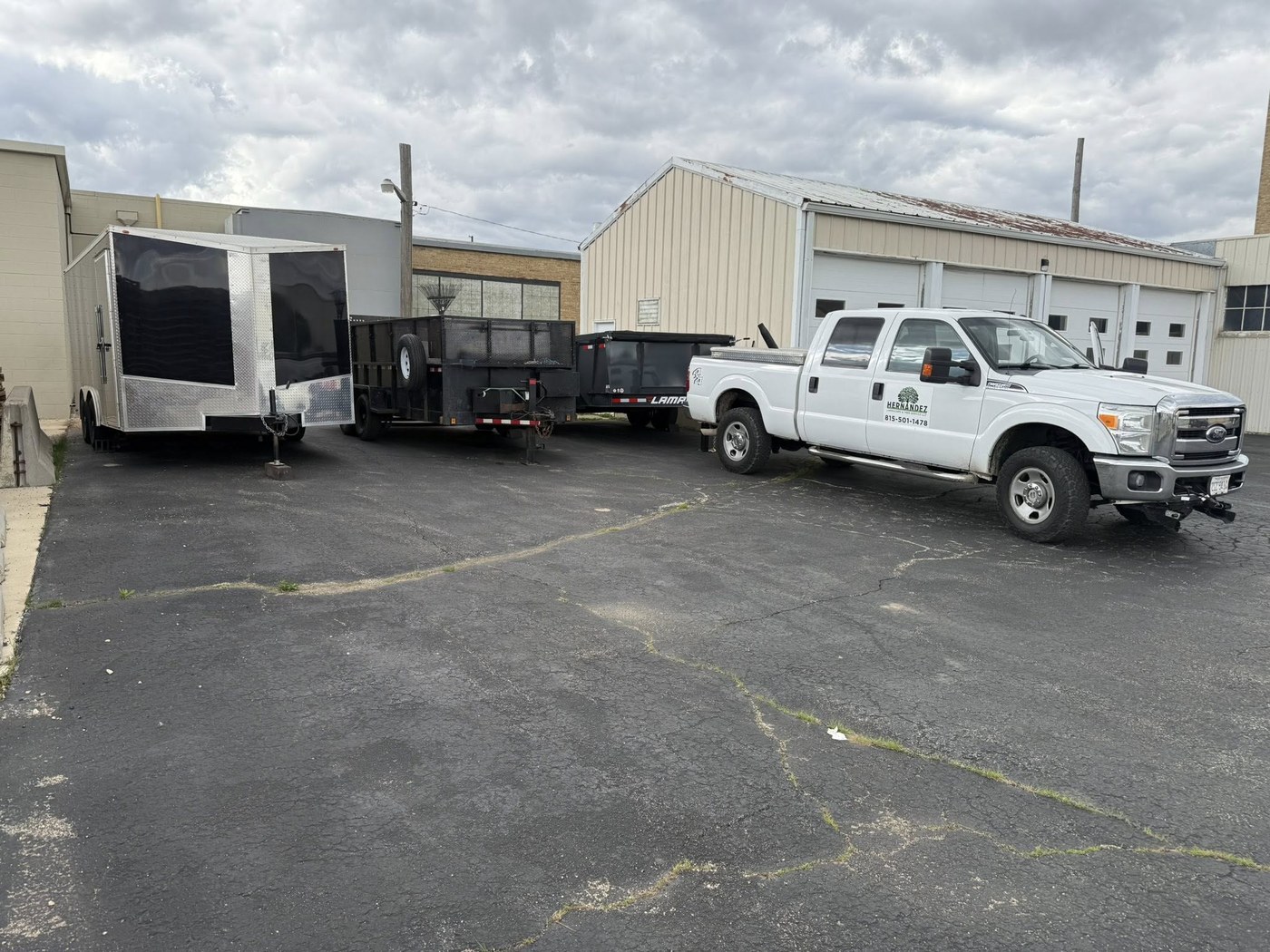 Hernandez Landscape and Tree Service branded truck and trailers