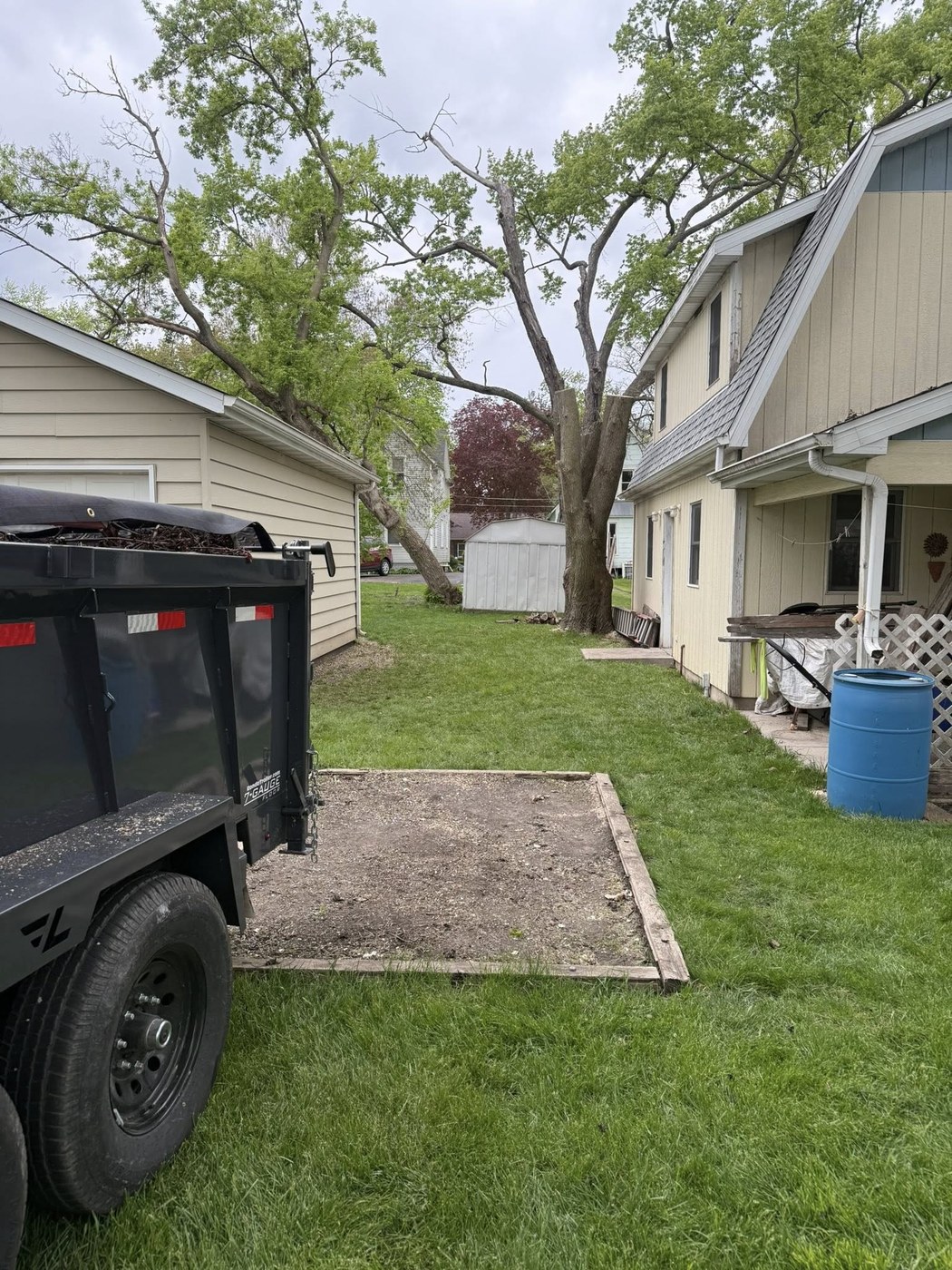 Completed yard work with Hernandez equipment on site